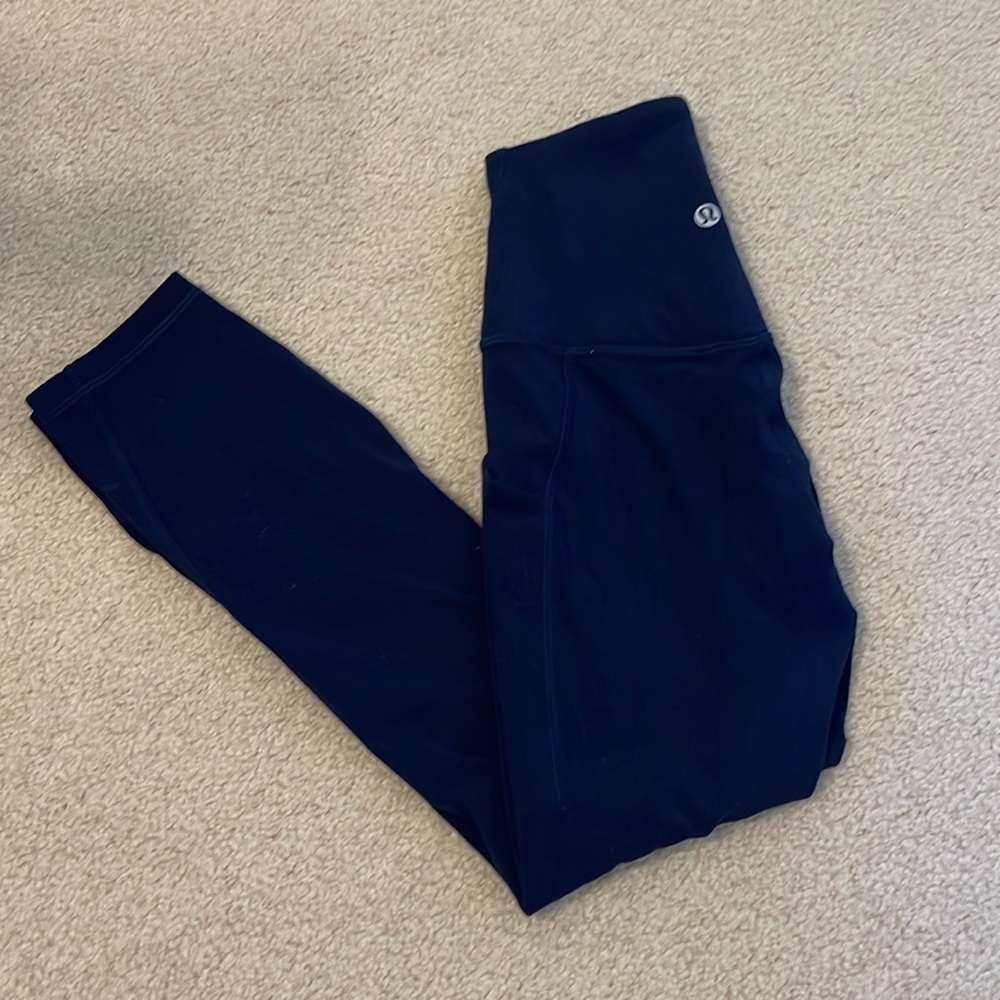 Lululemon navy blue leggings with pockets. Size 0